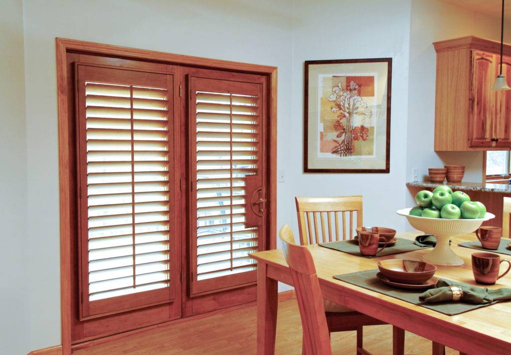 Outside mount, 3 1/2" louvers, Beaded L frame, French door cutout in light-medium natural lacquer