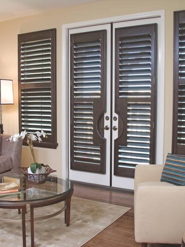 inside decorative brown shutters fitted by the shutter company